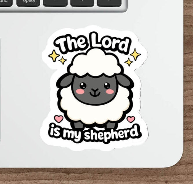 Cute Psalm 23 Christian sheep sticker featuring a smiling kawaii lamb with the words The Lord Is My Shepherd.