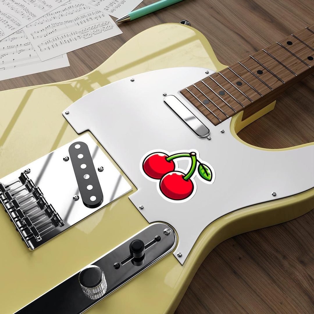 A bright and cheerful waterproof sticker of two cartoon cherries with leaves. Great for fruit lovers or personalizing items   KEOLIX 