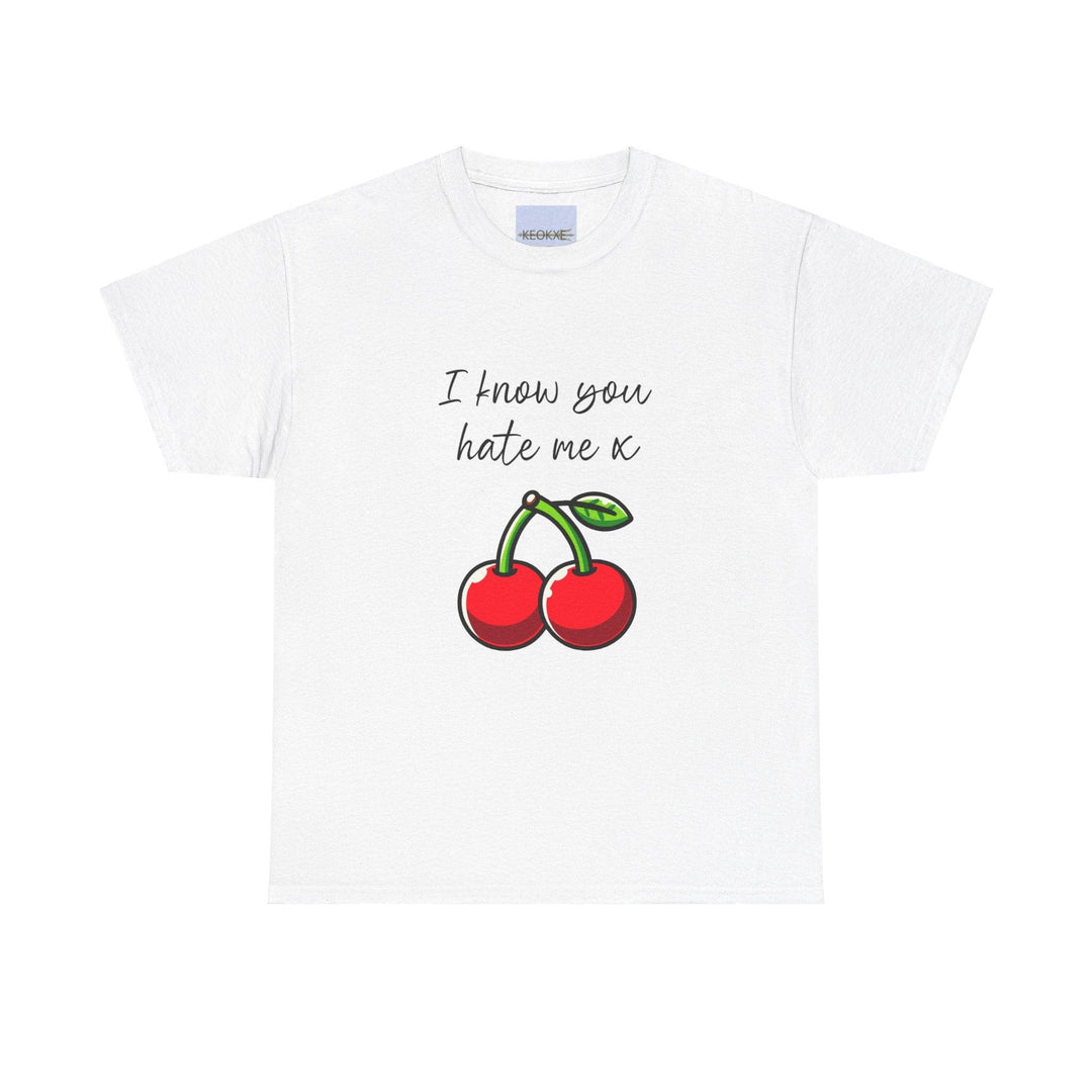 White T-shirt featuring a pair of red cherries and the phrase 'I Know You Hate Me.' A playful and slightly cheeky design for those with a sense of humor about life’s relationships."