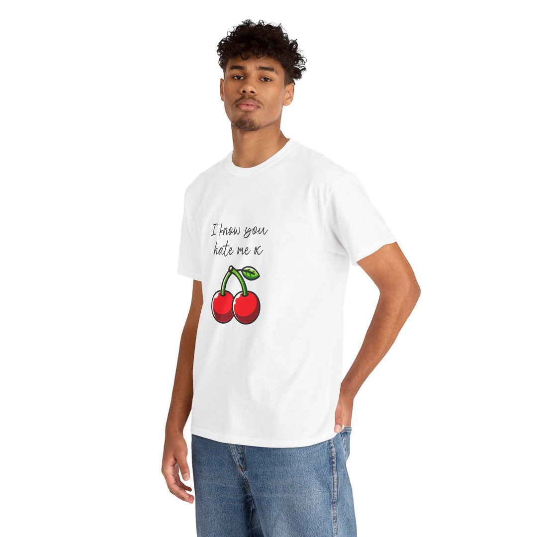White T-shirt featuring a pair of red cherries and the phrase 'I Know You Hate Me.' A playful and slightly cheeky design for those with a sense of humor about life’s relationships."