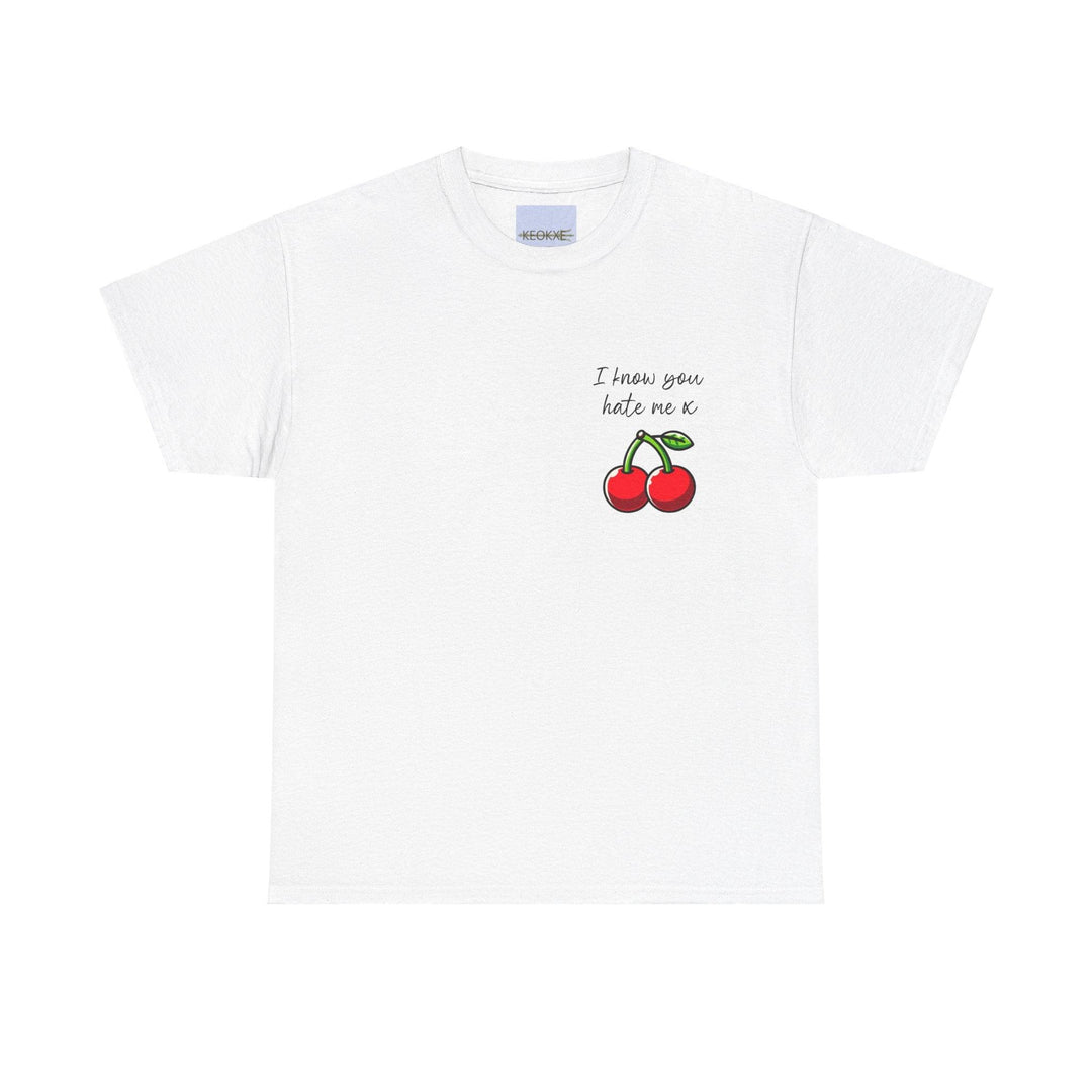 White T-shirt featuring a pair of red cherries and the phrase 'I Know You Hate Me.' A playful and slightly cheeky design for those with a sense of humor about life’s relationships."