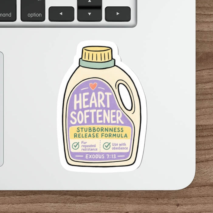 A die-cut sticker shaped like a bottle of &