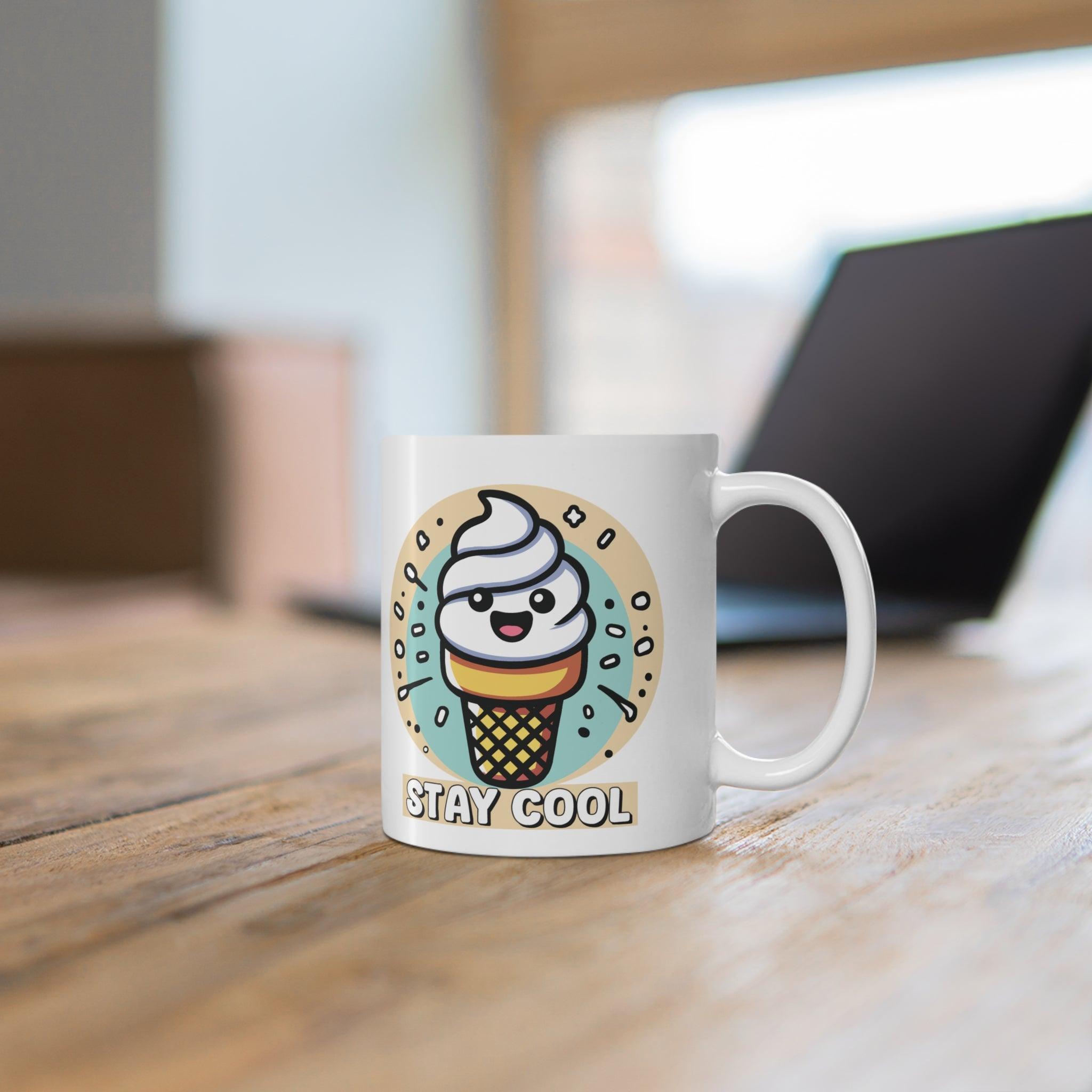 Fun ceramic mug featuring a cute ice cream cone character with sunglasses and the phrase 'Stay Cool.' Perfect for coffee or tea lovers who enjoy a playful touch - Baby Keo
