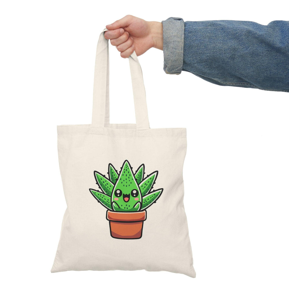 Eco-friendly canvas tote bag with a cute cartoon aloe vera plant design. Great for plant lovers and sustainable shopping - Baby Keo
