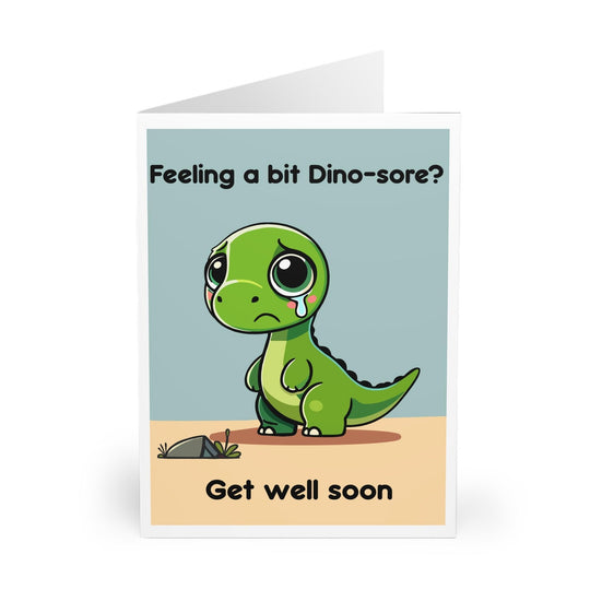 Cute get well soon card featuring a sad-looking dinosaur with the phrase &