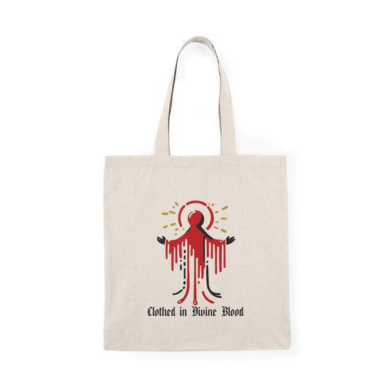 Tote bag featuring a striking design with the phrase 'Clothed in Divine Blood' artistically displayed alongside vivid graphics. The powerful imagery and bold colors convey a message of faith and strength, making it a unique accessory for those who want to express their spirituality with style."

