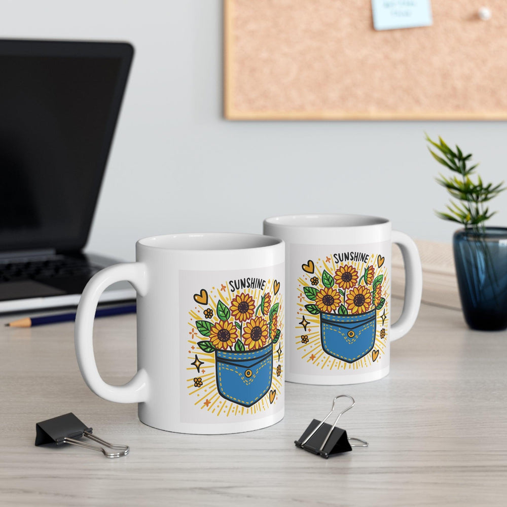 White ceramic mug featuring a sunflower design and the uplifting phrase 'Pocket Full of Sunshine,' bringing a bright and cheerful vibe to your mornings.