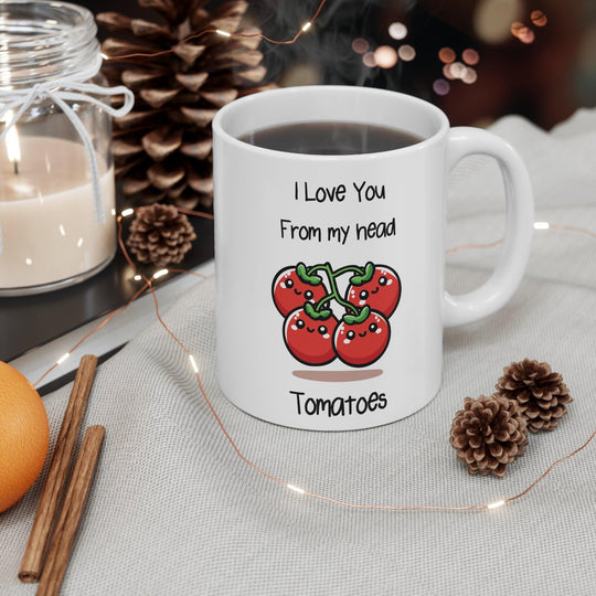 Cute white ceramic mug with a smiling tomato illustration and the pun 'I Love You from My Head Tomatoes,' ideal for spreading love with a smile."