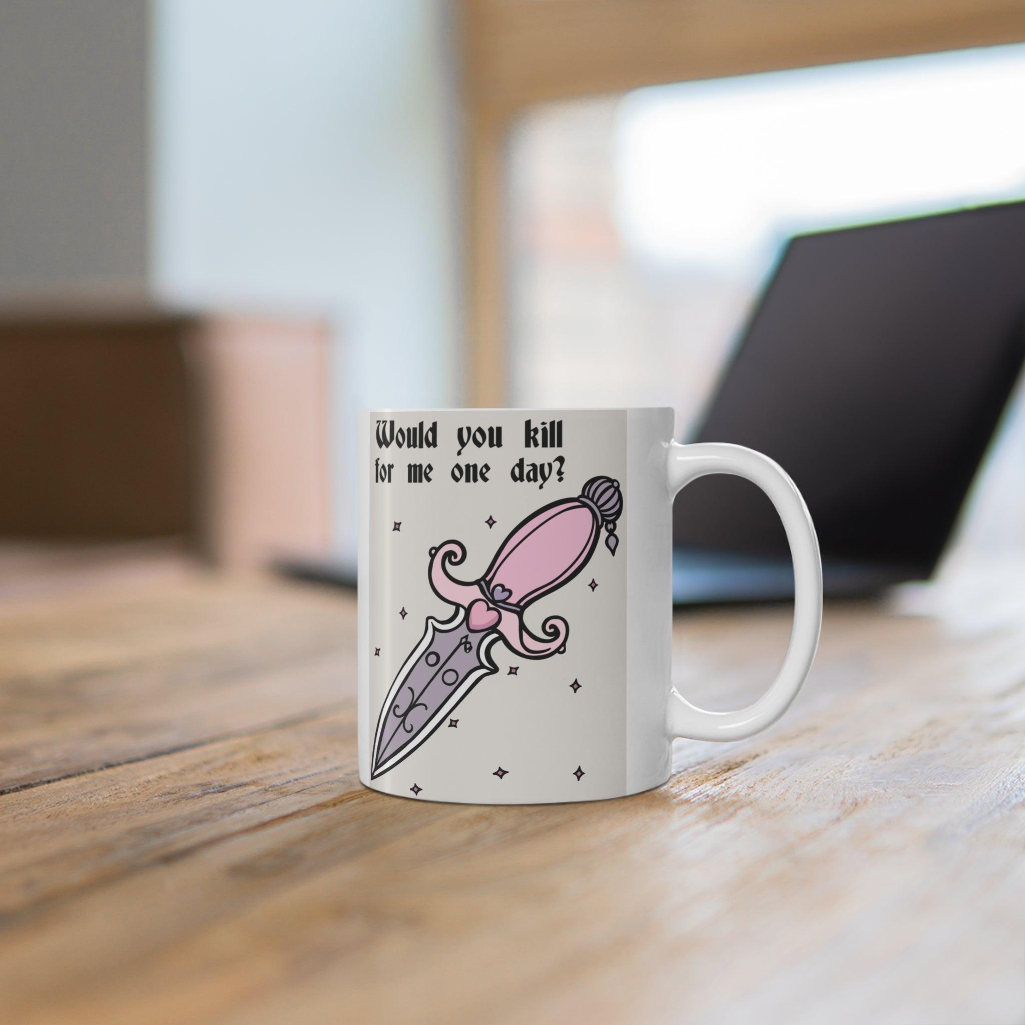Would You Kill for Me One Day?' Mug - "White ceramic mug featuring a dagger and heart illustration with the text 'Would You Kill for Me One Day?' adding a bold and cheeky twist to your coffee time."