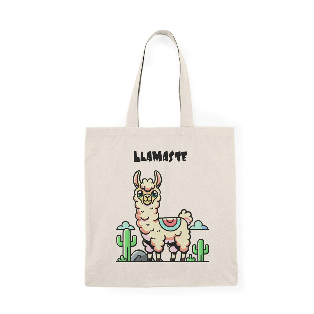 A natural tote bag featuring a whimsical illustration of a llama doing yoga with the text 'Llamaste' in bold letters. The lighthearted design merges fitness with humor, making it a great accessory for yoga lovers or anyone looking to add a bit of fun to their collection