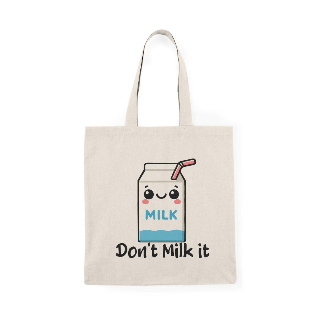 Tote bag featuring a playful illustration of a cartoon milk carton with the phrase 'Don't Milk It.' The vibrant design and cheerful graphics create a fun and whimsical accessory, perfect for adding a lighthearted touch to your everyday style while showcasing a love for dairy.