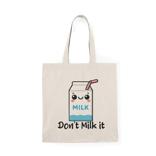 Tote bag featuring a playful illustration of a cartoon milk carton with the phrase 'Don't Milk It.' The vibrant design and cheerful graphics create a fun and whimsical accessory, perfect for adding a lighthearted touch to your everyday style while showcasing a love for dairy.