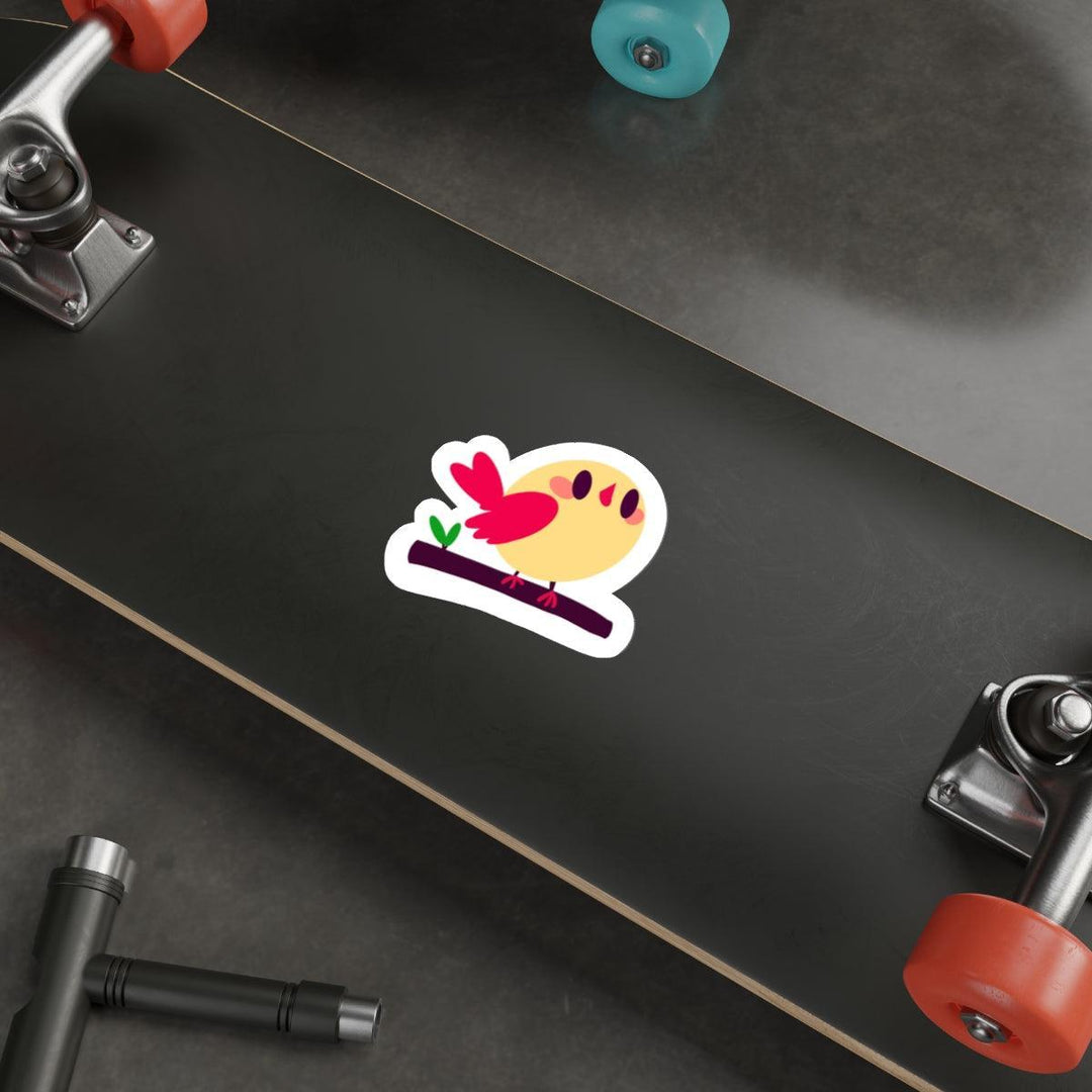 A cute cartoon bird sitting on a branch in a colorful design. Perfect for nature lovers or adding charm to notebooks - KEOLIX 