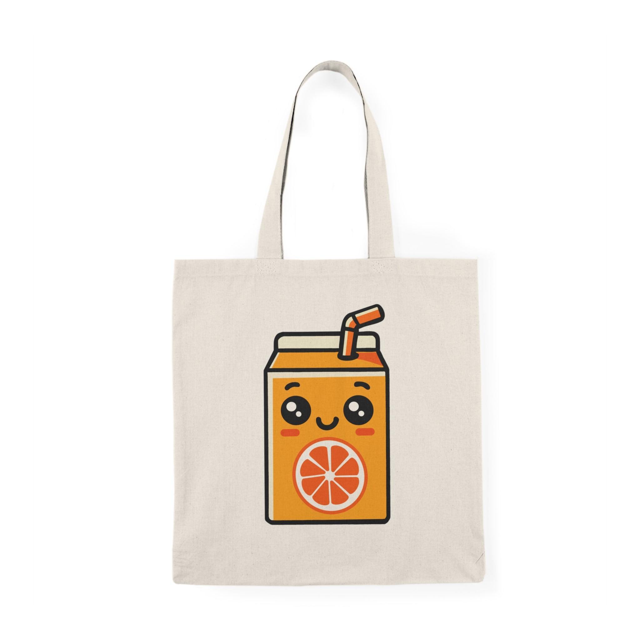 tote bag featuring an adorable illustration of a cartoon orange juice carton with a cheerful face and vibrant colors. The playful design adds a refreshing and fun touch, making it a perfect accessory for juice lovers and anyone looking to brighten up their everyday style."