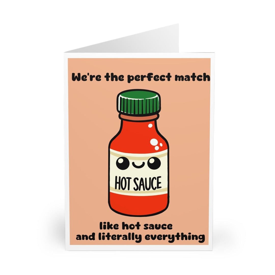 Playful greeting card featuring a bottle of hot sauce with the phrase 'We're the perfect match, like hot sauce and literally everything.' Perfect for couples who share a spicy sense of humor - Baby Keo.