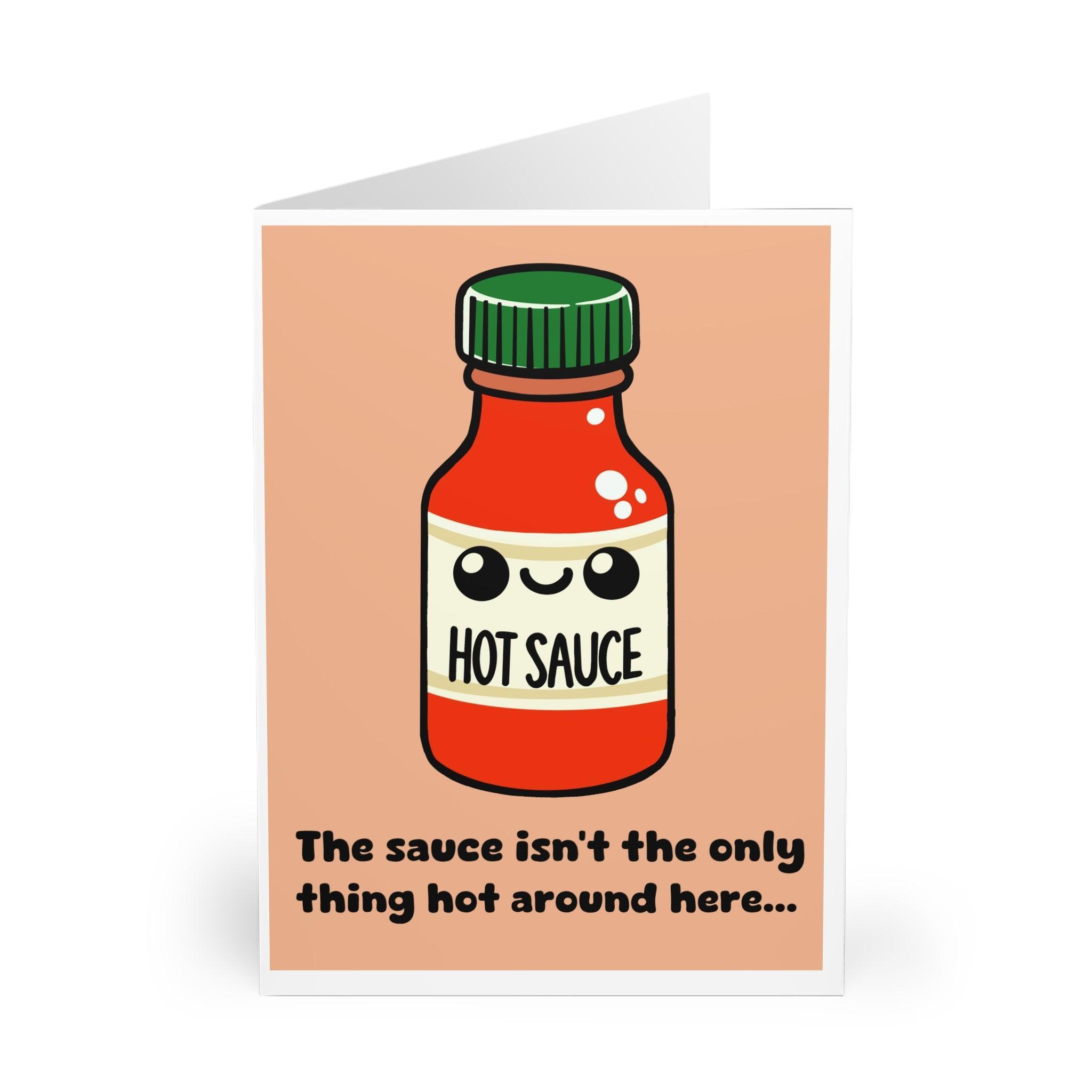 Playful card featuring a bottle of hot sauce with the phrase 'The Sauce Isn’t the Only Thing That's Hot Around Here.' A cheeky compliment for someone special - Baby Keo.