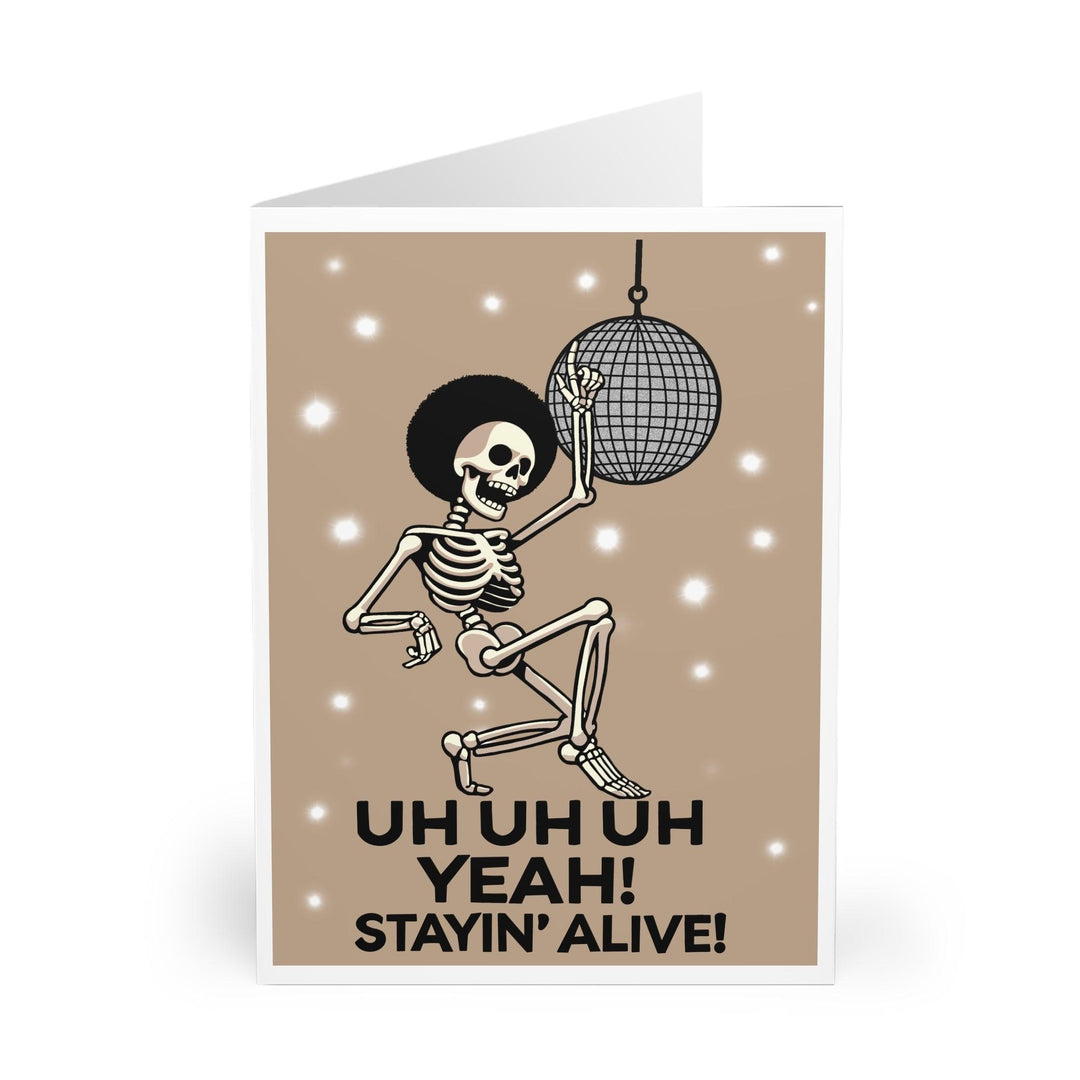 Fun card with a dancing skeleton under a disco ball, featuring the phrase 'Uh Uh Oh Yeah! Stayin' Alive!' A humorous card for someone who loves disco or a lighthearted celebration - Baby Keo