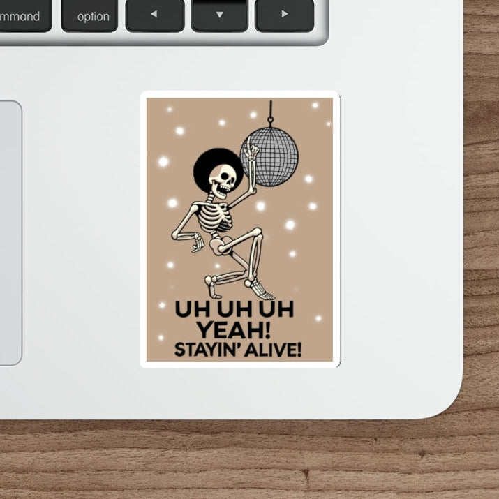 Stayin’ Alive Skeleton Waterproof Sticker: A playful skeleton doing a disco dance with a quote "Stayin' Alive," adding a humorous touch to any item while keeping the retro disco vibes alive. KEOLIX
