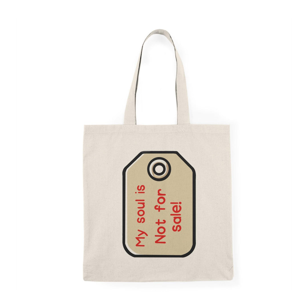 A cream tote bag featuring a minimalist design with a price tag graphic and the text 'My Soul is Not for Sale.' The straightforward message combined with a clean aesthetic conveys a strong statement about self-worth and individuality.