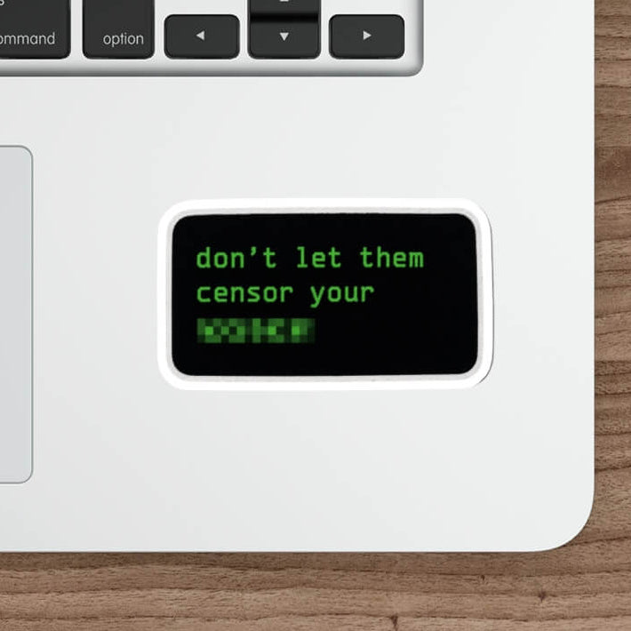 Don’t Let Them Censor Your Voice sticker with green pixel lettering, censored text and a black rectangular background