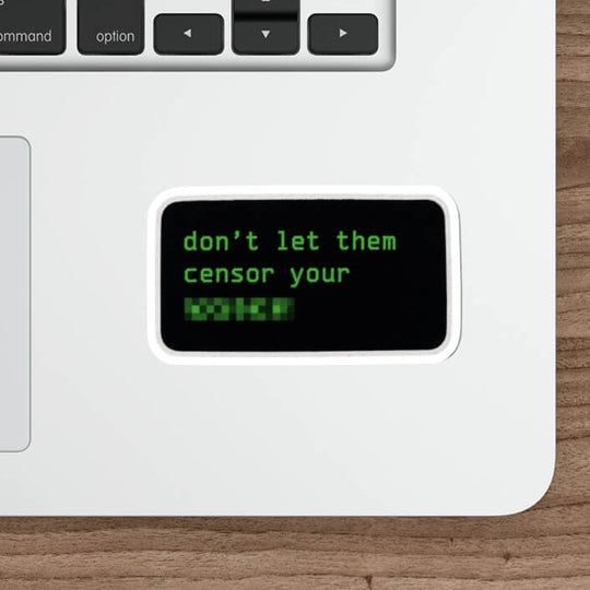 Don’t Let Them Censor Your Voice sticker with green pixel lettering, censored text and a black rectangular background