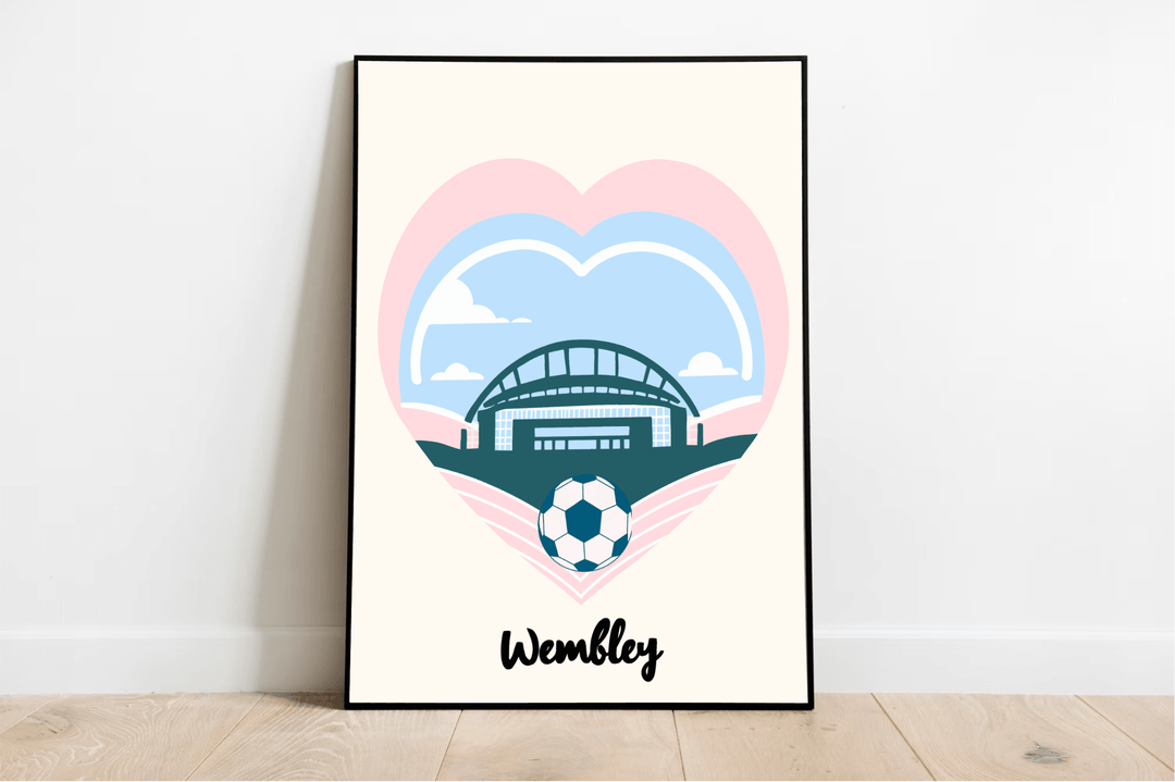 Add a touch of charm to your space with "The Wembley Essence" - an eye-catching Minimalist Football Print that's sure to capture hearts! This beautifully designed print rests gracefully on a wooden floor against a crisp white wall. It features the iconic Wembley Stadium nestled inside a vibrant blue heart outlined in playful pink, complete with a soccer ball poised perfectly at the tip. The word "Wembley" stands proudly beneath, perfectly encapsulating its spirit. Let this timeless piece bring elegance and 