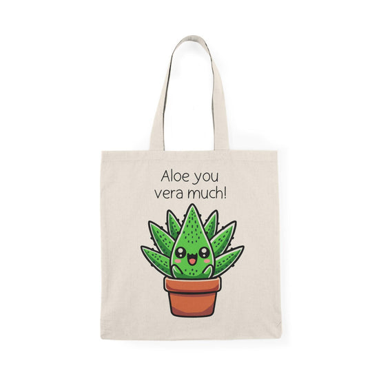 Tote bag featuring a delightful illustration of a cute aloe plant with a smiling face, accompanied by the punny phrase 'Aloe You Very Much.' The design combines playful colors and charming elements, making it a perfect accessory for expressing gratitude and affection in a fun and stylish way."