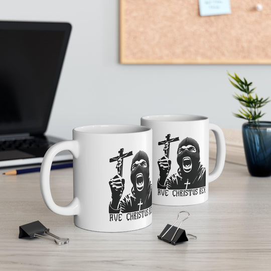 Bold black-and-white mug featuring a dramatic image of Christ with the text 'Ave Christus Rex,' perfect for a statement coffee break