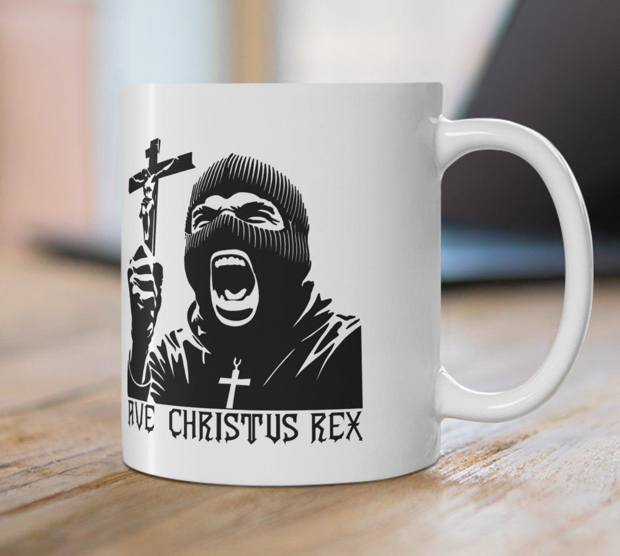 Bold black-and-white mug featuring a dramatic image of Christ with the text 'Ave Christus Rex,' perfect for a statement coffee break
