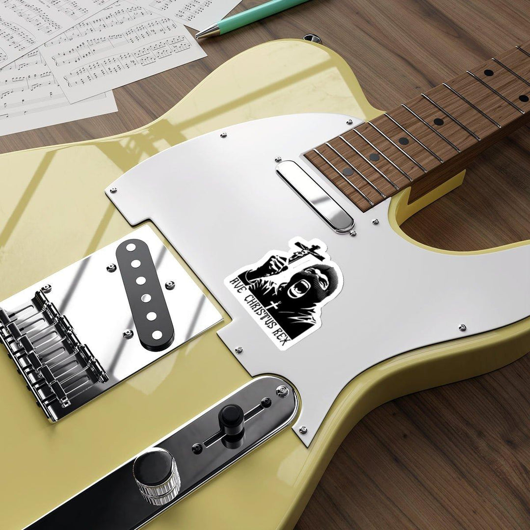 A religious-themed waterproof sticker featuring a figure holding a cross with the phrase 'Ave Christus Rex.' Perfect for those looking to express their faith - Baby Keo