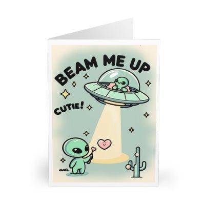 Adorable greeting card featuring a smiling alien and the phrase 'Beam Me Up, Cutie!' Perfect for sci-fi lovers or anyone who enjoys a cute and quirky card - Baby Keo.