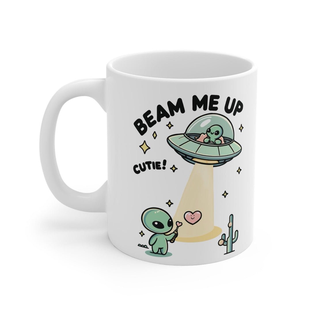 Fun and playful white ceramic mug with alien illustrations and the cheeky text 'Beam Me Up, Cutie!,' giving your morning a cosmic lift