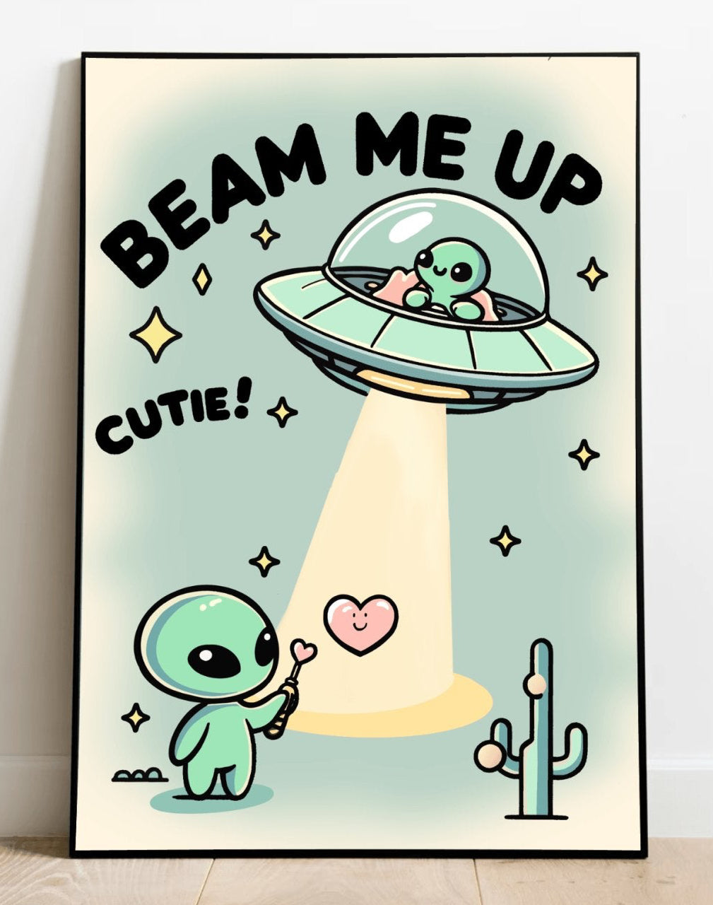 A "Beam Me Up, Cutie" waterproof sticker from  KEOLIX adorns a wooden gift box with a green ribbon, placed on a festive table amidst holiday ornaments and gingerbread cookies. The sticker features whimsical artwork of a cartoon baby alien alongside the text, "This gift is outta this world," inviting you on a cosmic adventure.