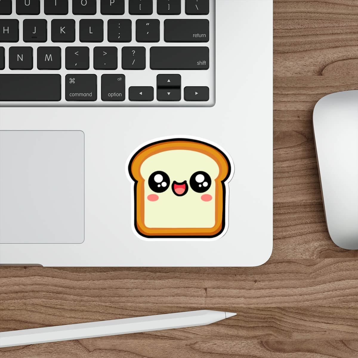 Kawaii-style bread slice sticker with a happy, blushing face placed on a laptop. A fun, cute decal perfect for decorating tech, notebooks, or water bottles