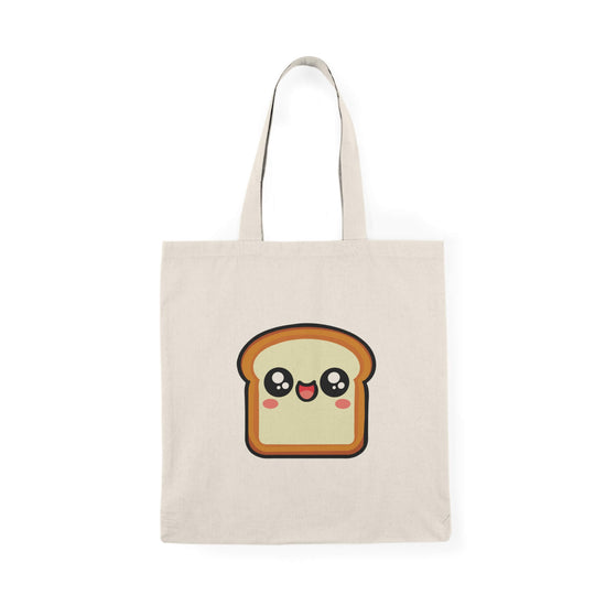 A natural beige tote bag featuring a cute, smiling slice of bread with big, sparkling eyes and rosy cheeks. Made from 100% recycled cotton, this eco-friendly bag is lightweight yet durable. Perfect for shopping, carrying books, or adding a touch of fun to everyday outfits.


