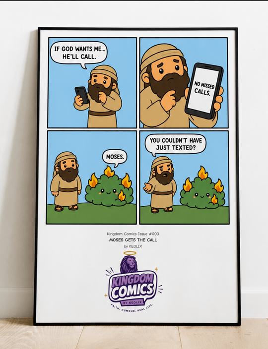 A framed vertical comic print leaning against a white wall on a light wood floor. The comic shows a cartoon man with a beard making phone calls, with one panel showing flames behind him and text at the bottom including the &