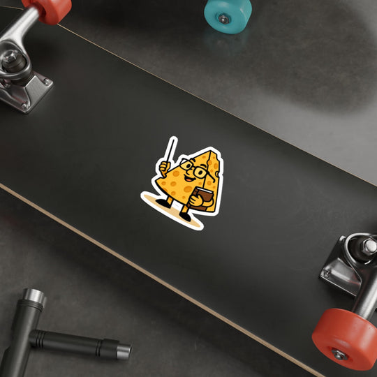 Cartoon-style vinyl sticker of a wedge of cheese with glasses and a book, smiling and giving a thumbs-up. Text reads: “This might be a bit cheesy… but you’re a brie-lliant teacher!”