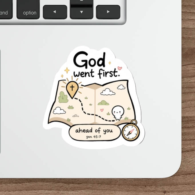 Cute Genesis 45:7 Christian sticker featuring a map with a path leading to a cross, a compass and the words God Went First Ahead Of You.
