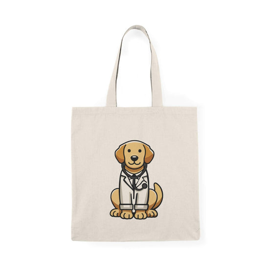 A stylish tote bag featuring an adorable illustration of a golden retriever dressed as a doctor, wearing a white lab coat and stethoscope. The bag is made from 100% recycled cotton with a natural finish, measuring 40 x 38 cm (15.7 x 15 inches).