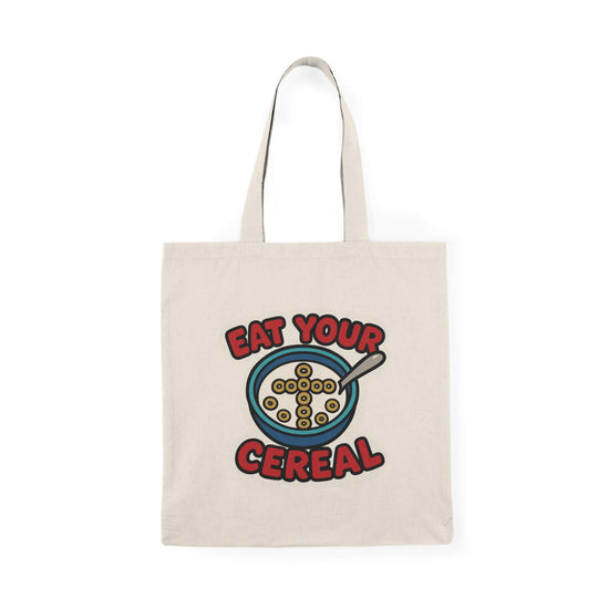 Faith-inspired funny tote bag with ‘Eat Your Cereal’ design featuring a cross made of cereal in a bowl – reusable cotton bag by Keolix