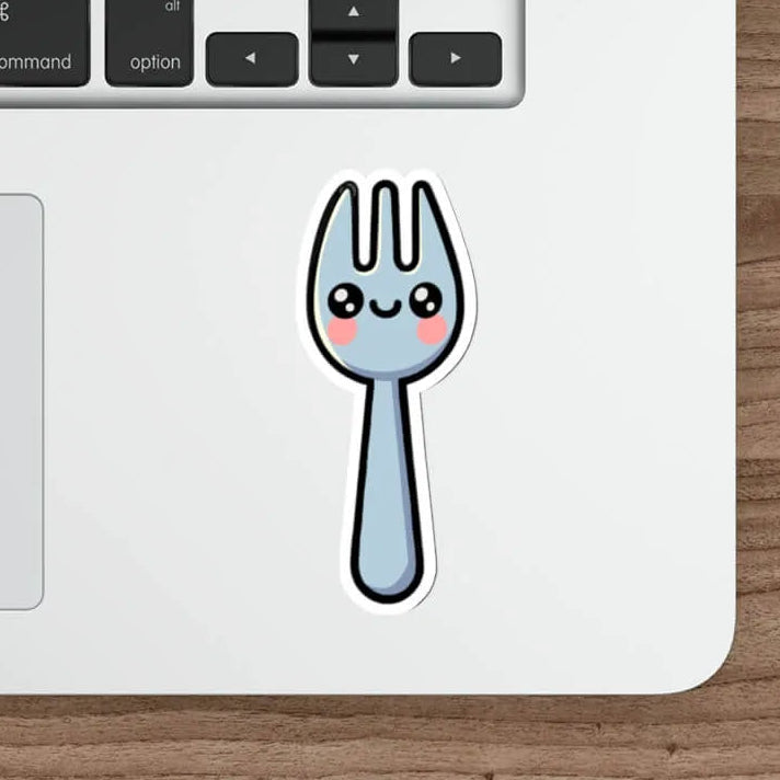 A cute and playful die-cut spork sticker featuring a smiling cartoon spork with rosy cheeks. The sticker has a bold black outline and is designed for durability, making it ideal for decorating laptops, notebooks, water bottles, and more. Available as a single sticker, a pack of 3, or a pack of 6. Waterproof and long-lasting.