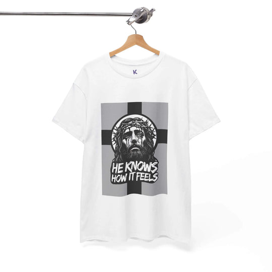 White Christian T-shirt featuring a monochrome Jesus design with the phrase "He Knows How It Feels," symbolizing faith, resilience, and divine understanding.


