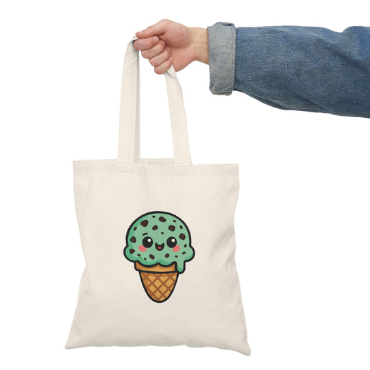 White cotton tote bag with mint choco chip kawaii ice cream design – “You’re Mint” pun bag with cute cartoon face, perfect for gifts and everyday use.