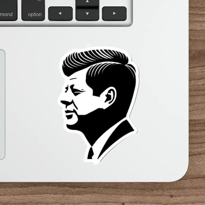 A stylish sticker featuring a minimalist black silhouette of John F. Kennedy in profile. Available with or without a background of minimalist USA flag stripes. Choose from single sticker, pack of 3, or pack of 6.