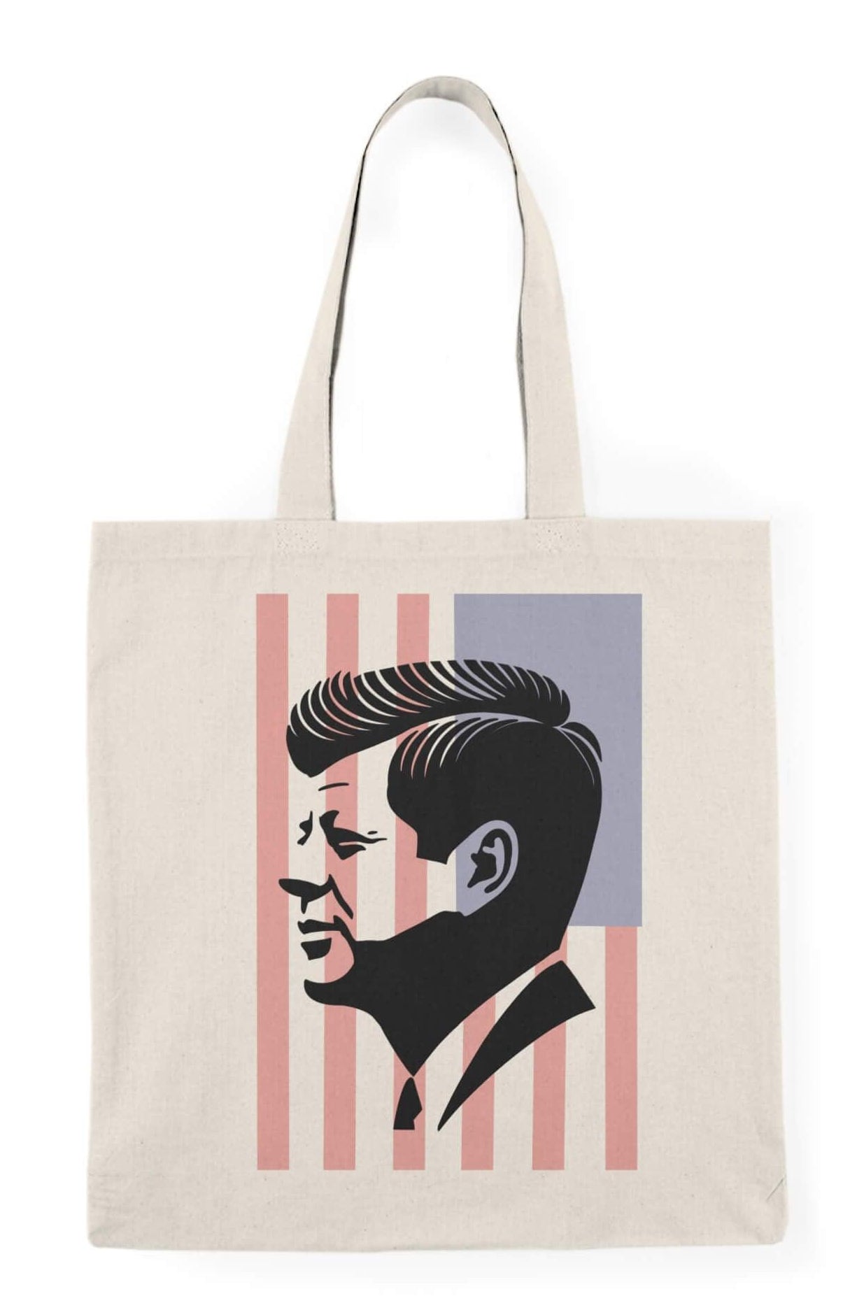 A stylish tote bag featuring a minimalist black silhouette of John F. Kennedy in profile, printed on natural recycled cotton. Optionally available with a subtle USA flag background design. Perfect for carrying essentials in a sleek, iconic style.

