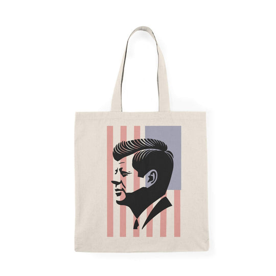 A stylish tote bag featuring a minimalist black silhouette of John F. Kennedy in profile, printed on natural recycled cotton. Optionally available with a subtle USA flag background design. Perfect for carrying essentials in a sleek, iconic style.

