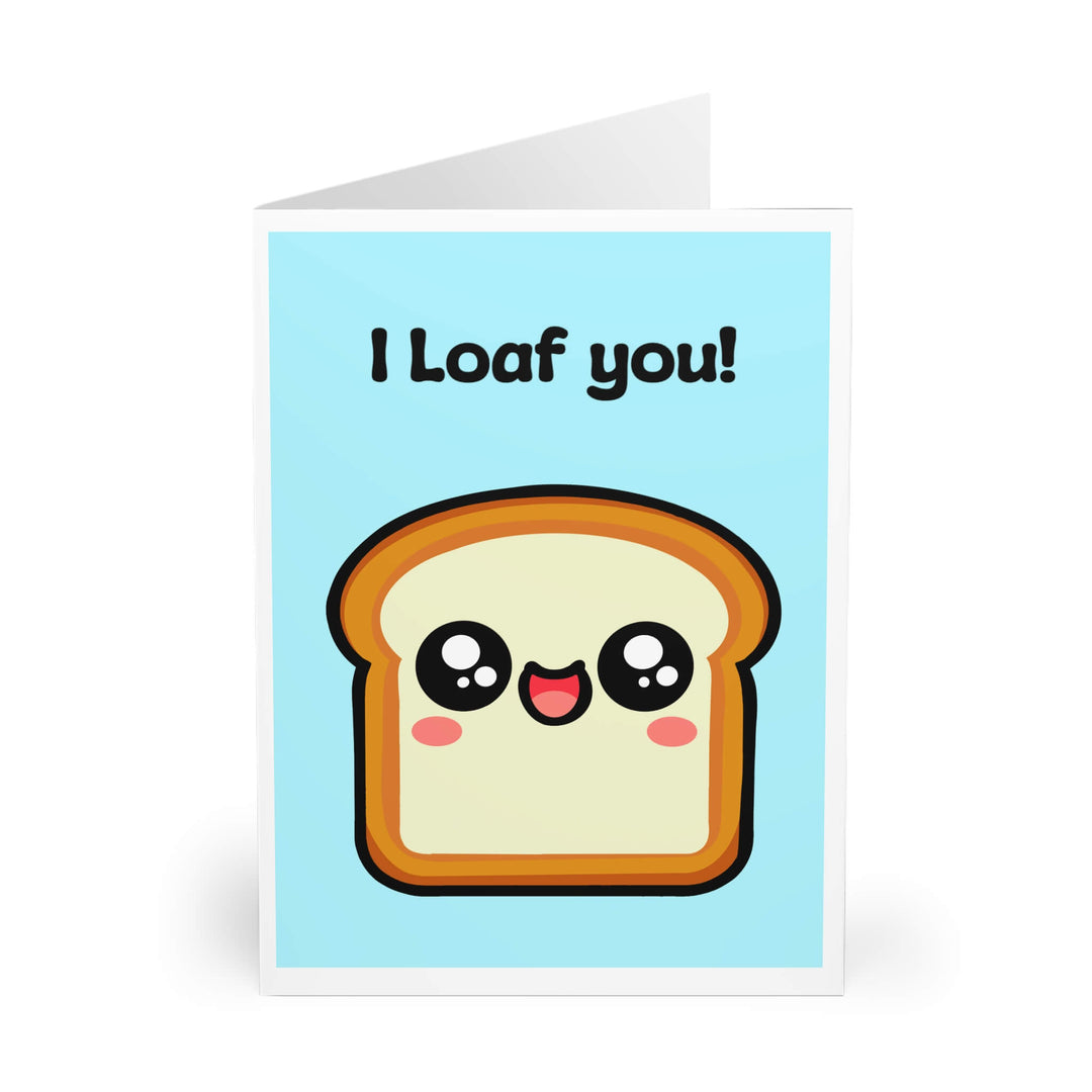 A cute and funny greeting card featuring a happy, smiling slice of bread with rosy cheeks on a light blue background. The card displays the pun "I Loaf You!" in playful, bold text. Perfect for expressing love, appreciation, or friendship in a sweet and humorous way.