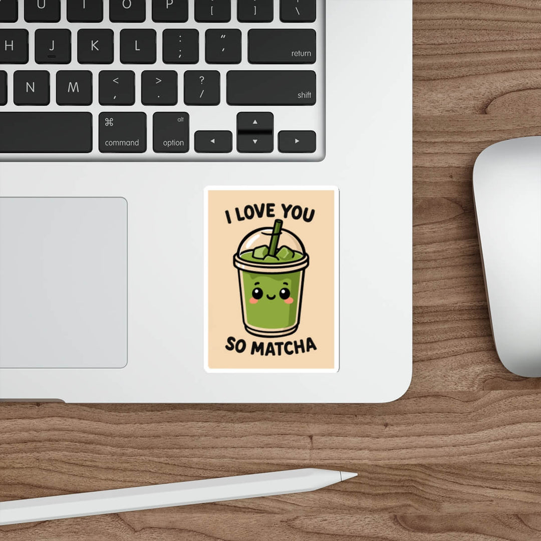 Cute green matcha drink sticker with smiling face and text that says “I Love You So Matcha,” shown on a laptop.