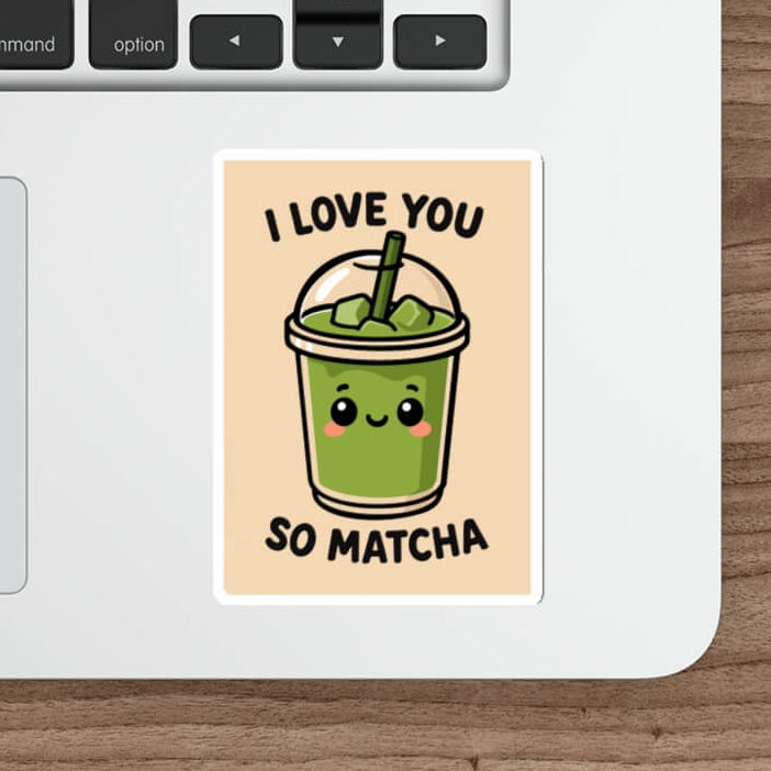 Cute green matcha drink sticker with smiling face and text that says “I Love You So Matcha,” shown on a laptop.