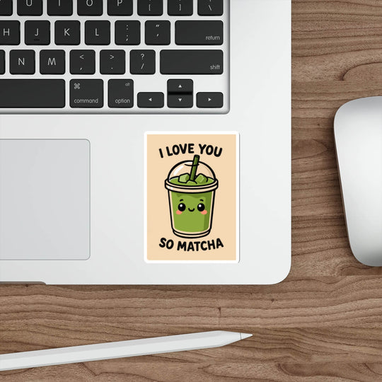Cute green matcha drink sticker with smiling face and text that says “I Love You So Matcha,” shown on a laptop.